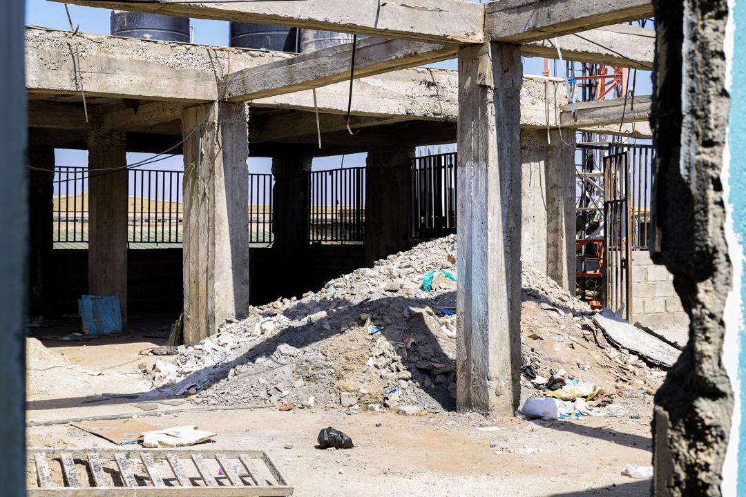 Construction site managed by Bulicon Engineering with scaffolding and workers